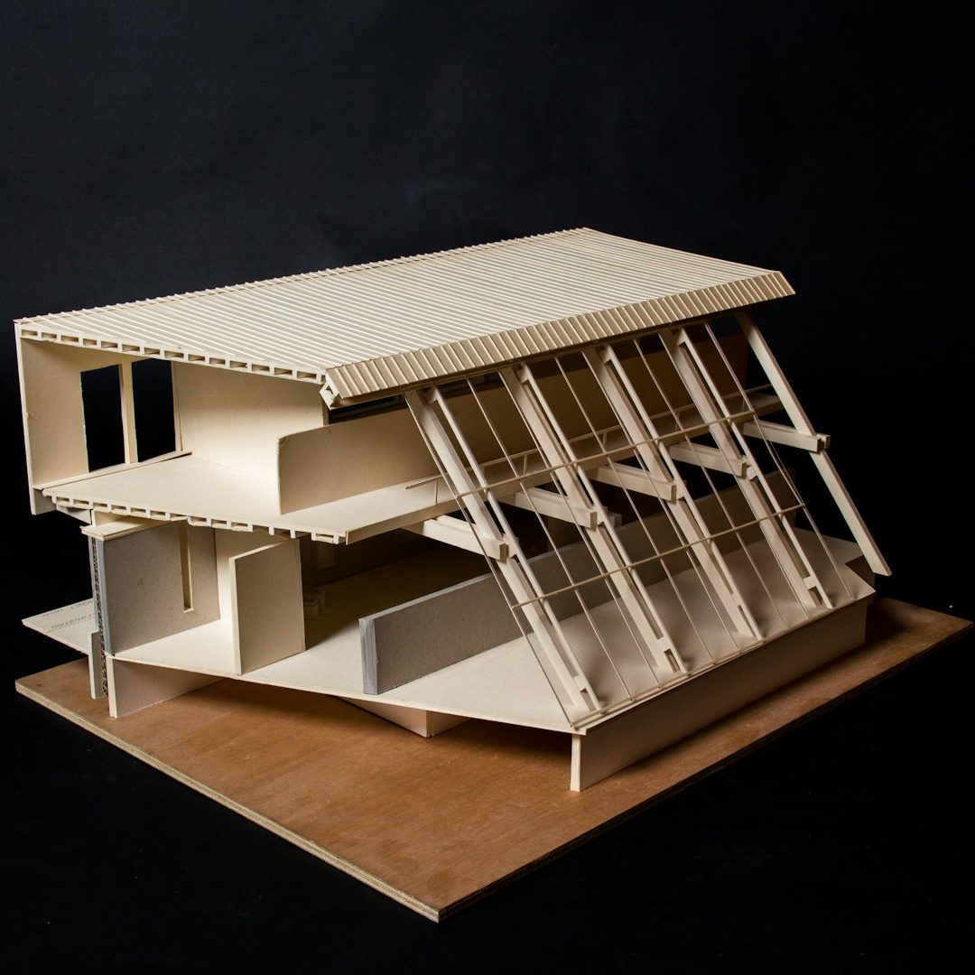 Hurland 3D Model of a modern building with multiple levels and large windows, set on a dark background.